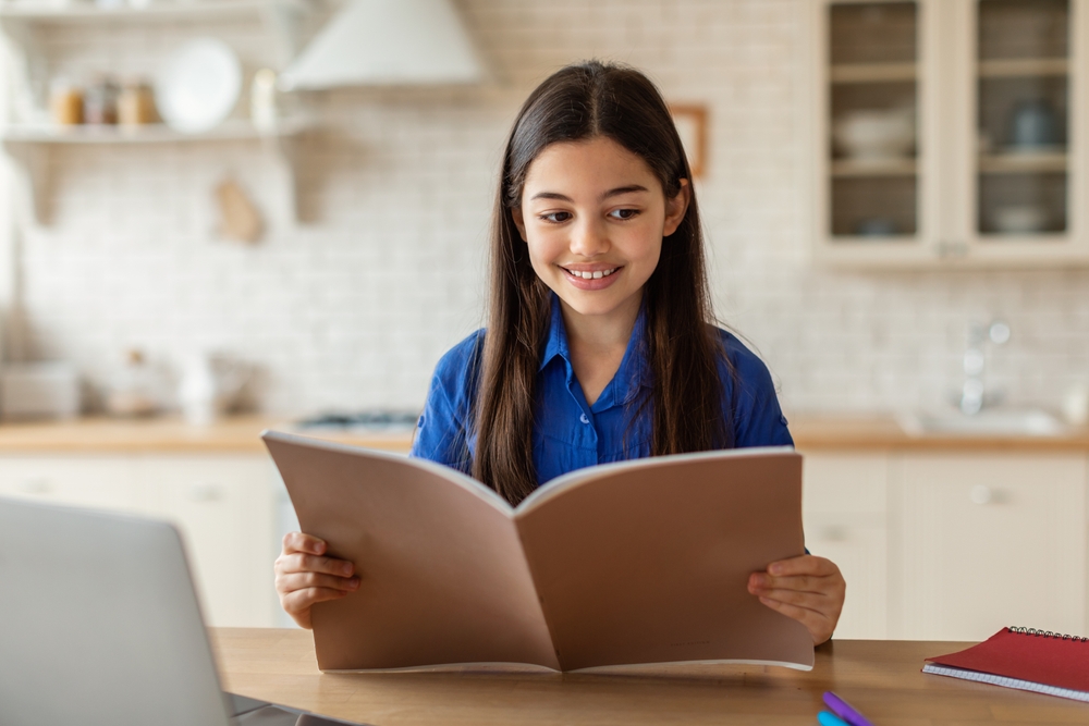 Middle school-aged girl studying