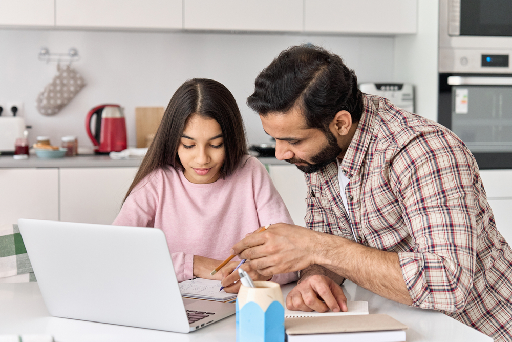 Dad and daughter creating independent school application